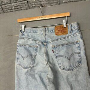 Levis 550 Relaxed Fit Tapered Leg Light Wash Jeans Mens 32x30 Raw Hem Vintage